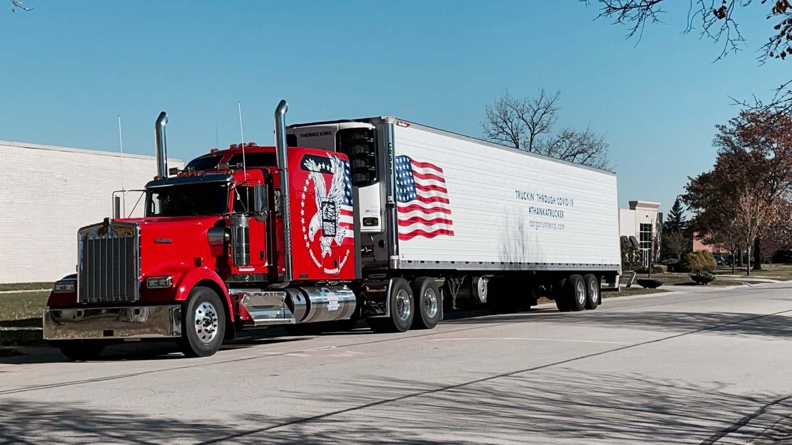 Cargo Runner red Kenworth and refrigerated trailer